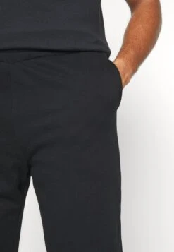 YOURTURN Unisex - Trainingsbroek - Black -YOURTURN Winkel 07c1b5cdab9b40debc97178217a47ad0