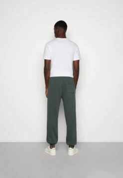 YOURTURN Oversized Unisex - Trainingsbroek -Dark Green 8 YOURTURN Oversized Unisex - Trainingsbroek -Dark Green -YOURTURN Winkel 42776076c49c4d49984fa3254d41719b