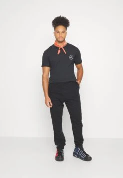 YOURTURN Unisex - Trainingsbroek - Black -YOURTURN Winkel 4726d7ee4d5647f8a5f5c8ffe5554ff0