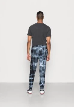 YOURTURN Monochrome Tie Dye Jogger Unisex - Trainingsbroek - Black/Off White -YOURTURN Winkel 7793c33a8ea44501a122fcabc111a020