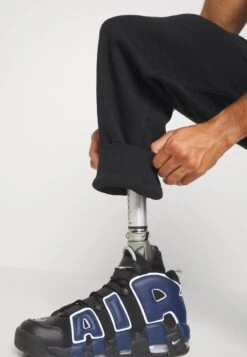 YOURTURN Unisex - Trainingsbroek - Black -YOURTURN Winkel 96890d6b49c24a0ca097867b183abe35