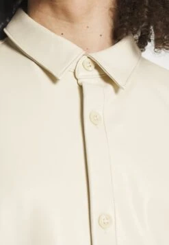 YOURTURN Unisex - Imitatieleren Jas - Beige -YOURTURN Winkel a32ba3b97fb84e7fae95b9c061124838